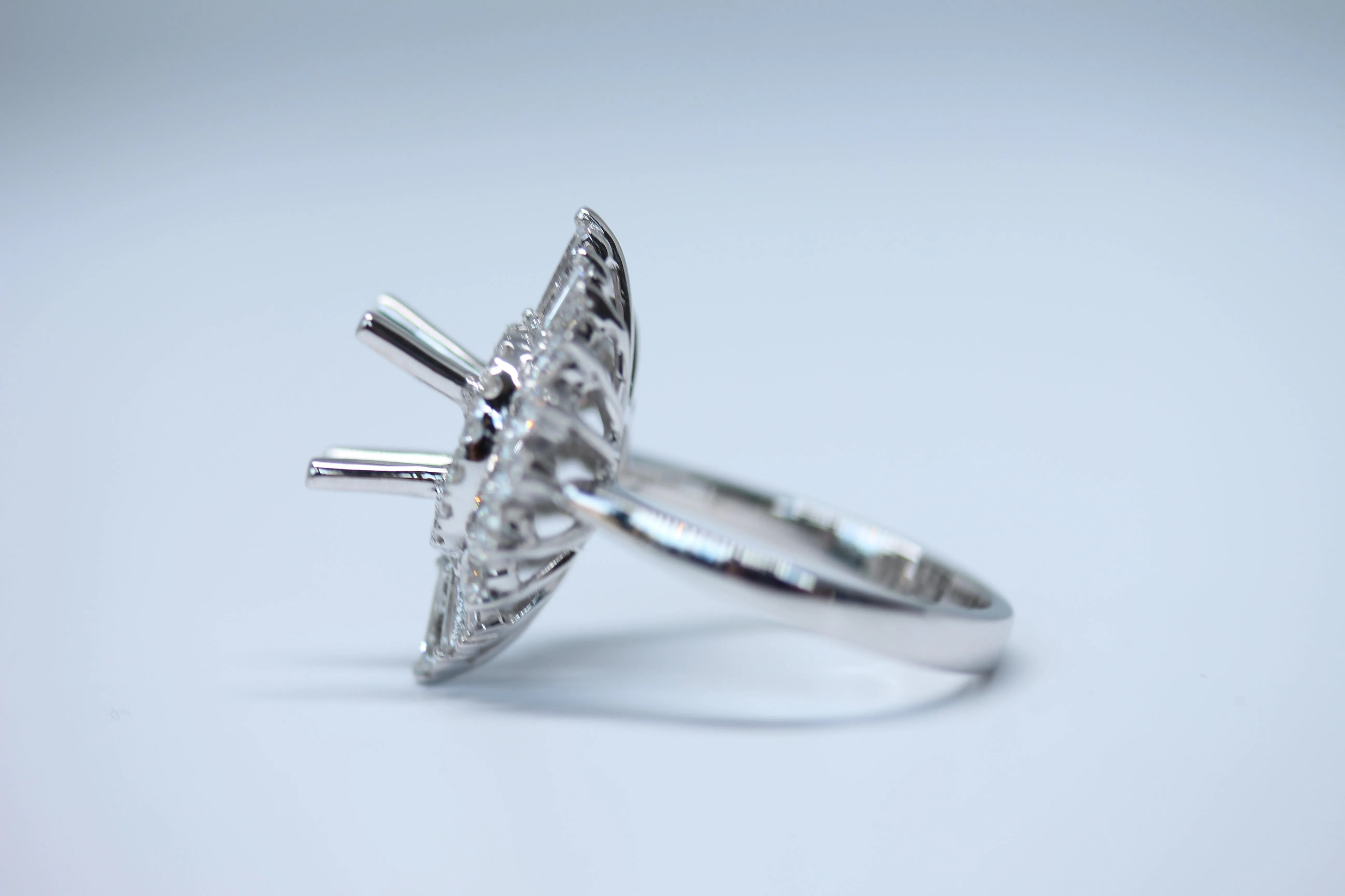 Art Deco Inspired Diamondaire Engagement Ring with Round and Baguette Diamonds