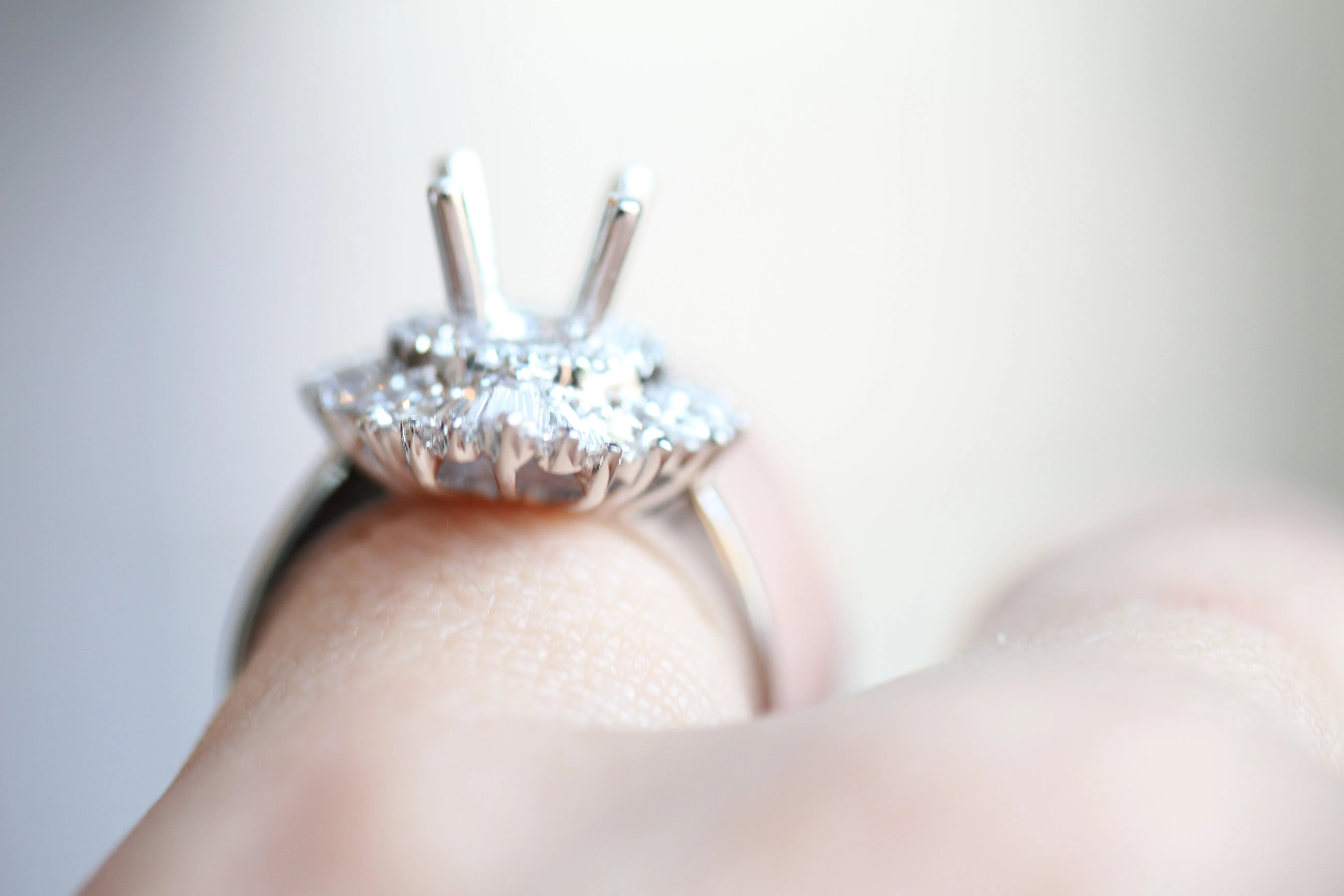 Art Deco Inspired Diamondaire Engagement Ring with Round and Baguette Diamonds