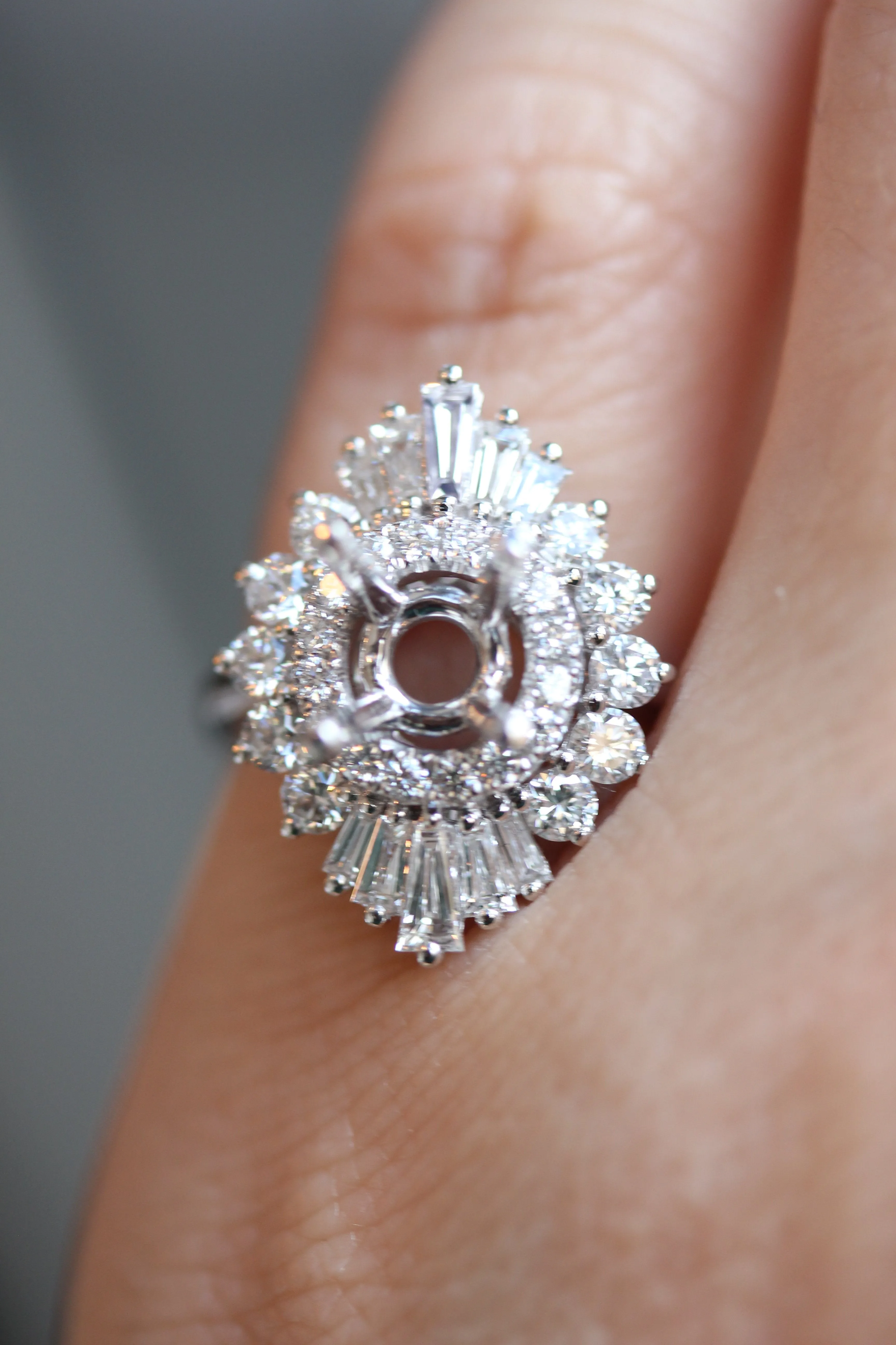 Art Deco Inspired Diamondaire Engagement Ring with Round and Baguette Diamonds