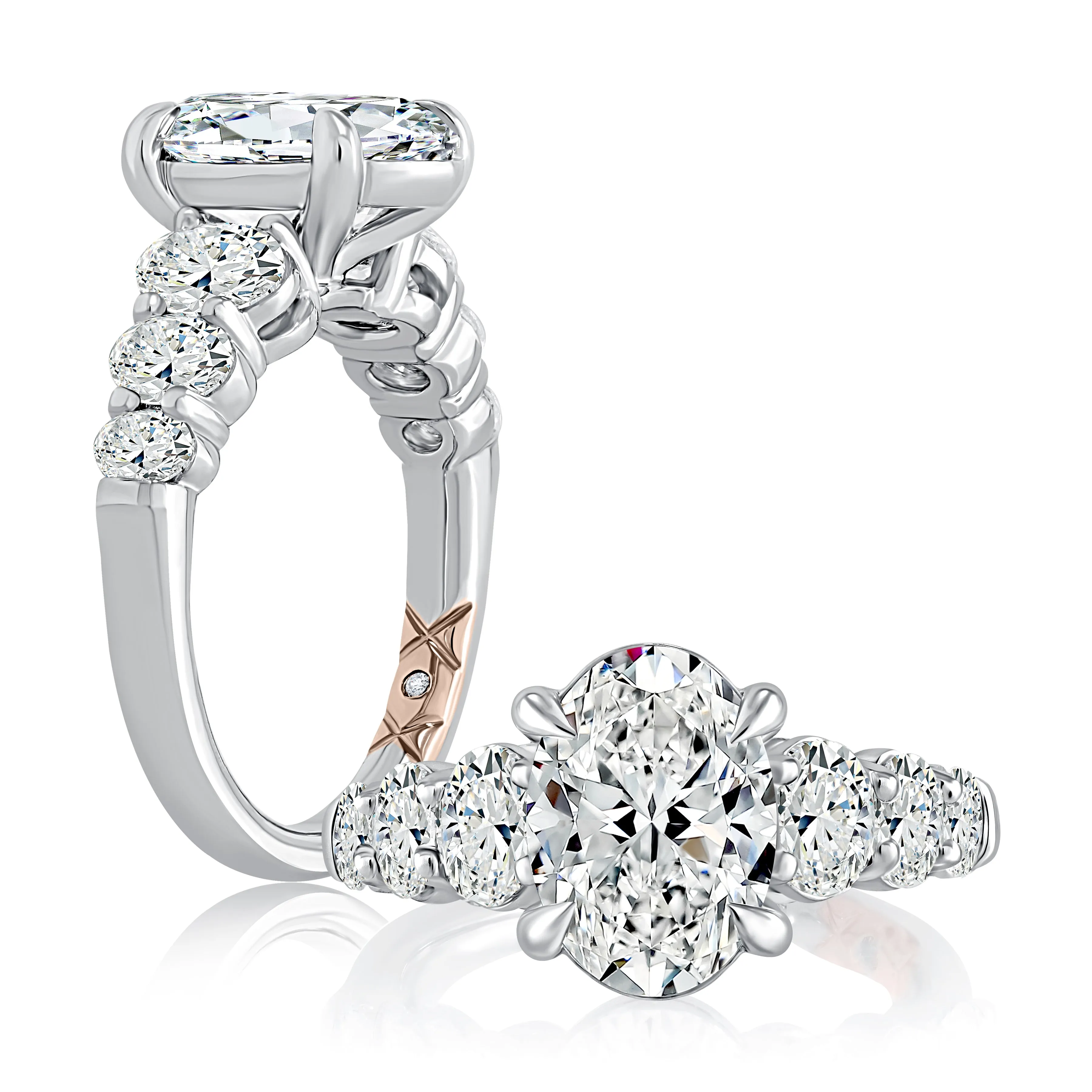 Classic Four Prong Oval Cut Diamond Flanked Engagement Ring