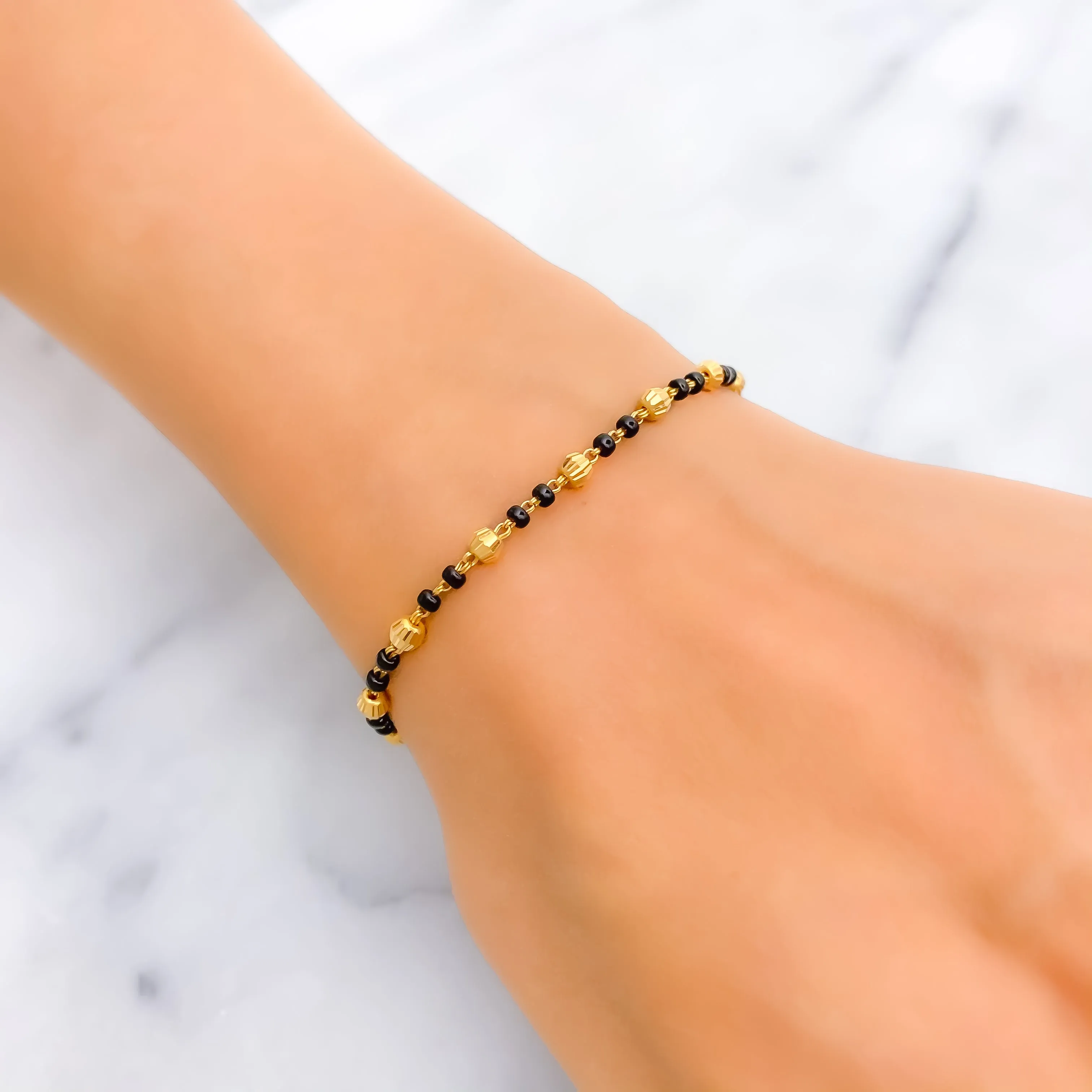 Dainty Chic 22k Gold Black Bead Bracelet