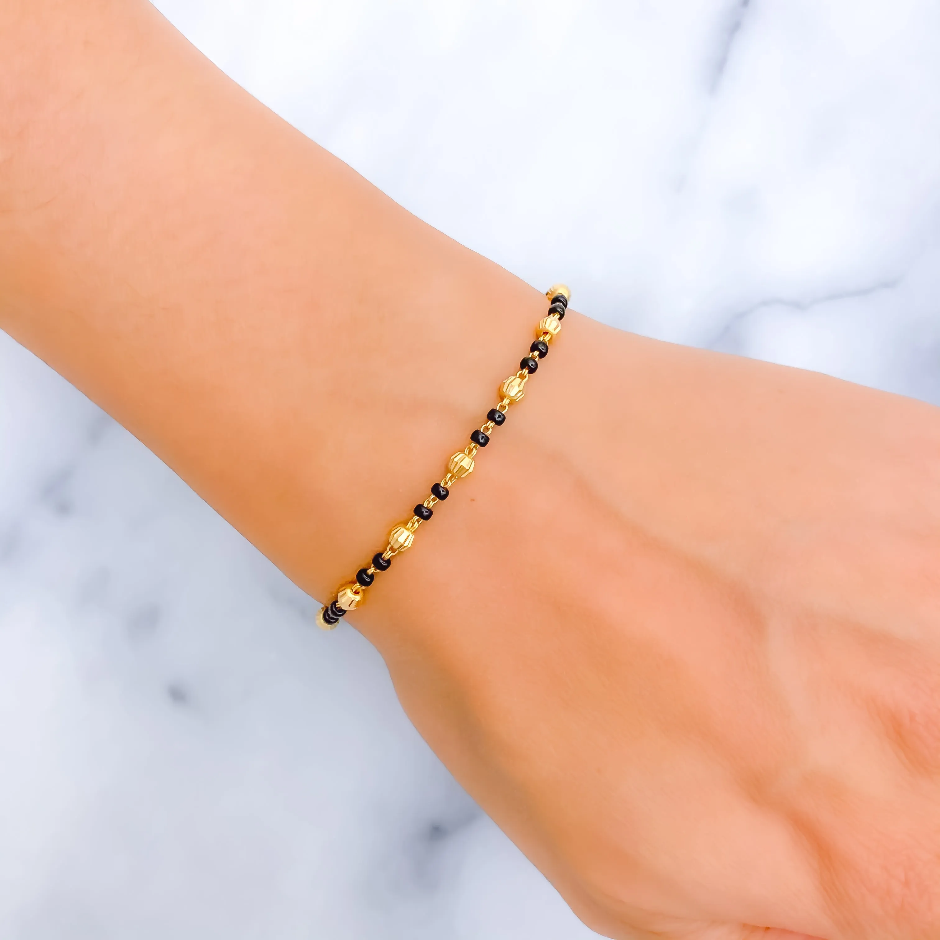 Dainty Chic 22k Gold Black Bead Bracelet