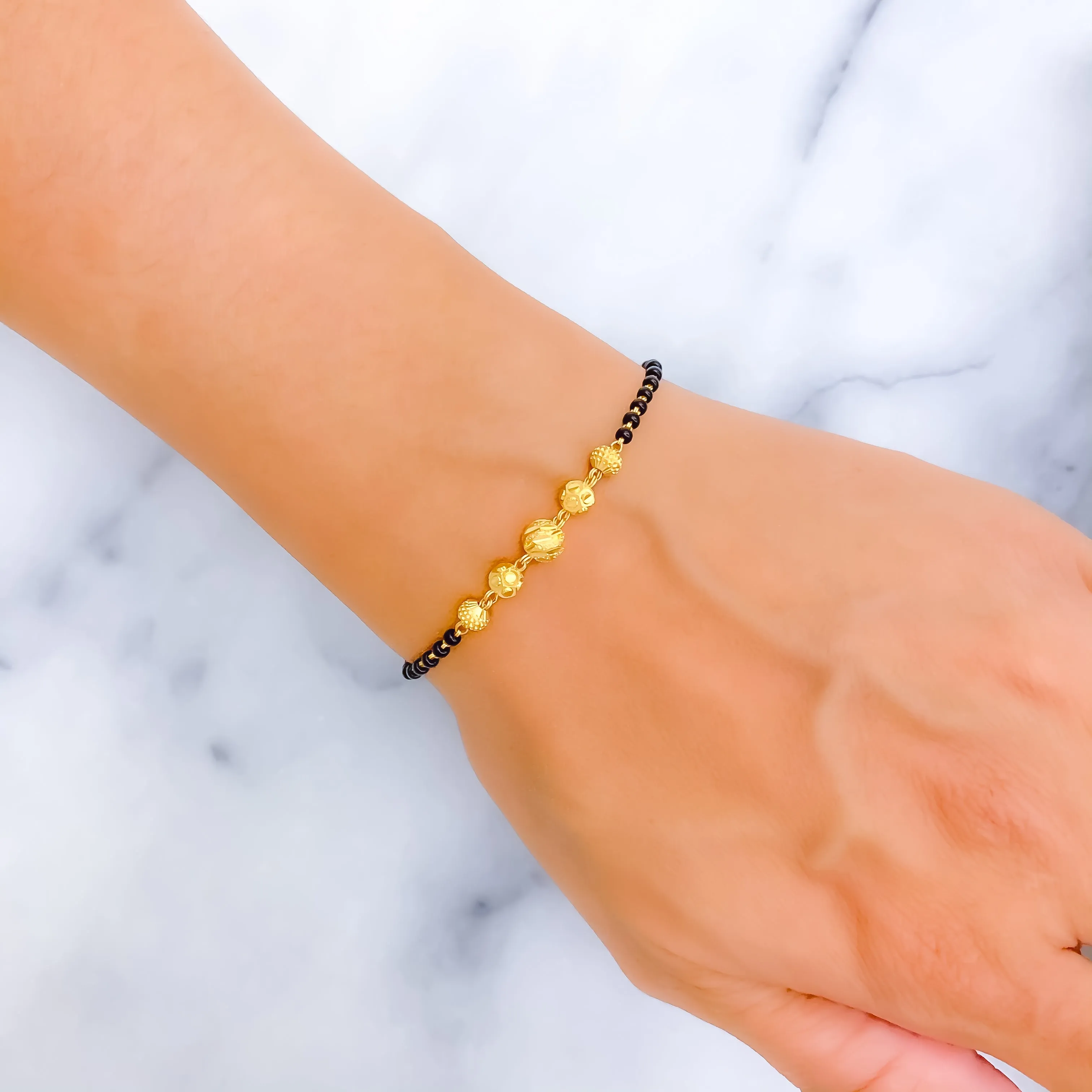 Elevated Fashionable 22k Gold Black Bead Bracelet