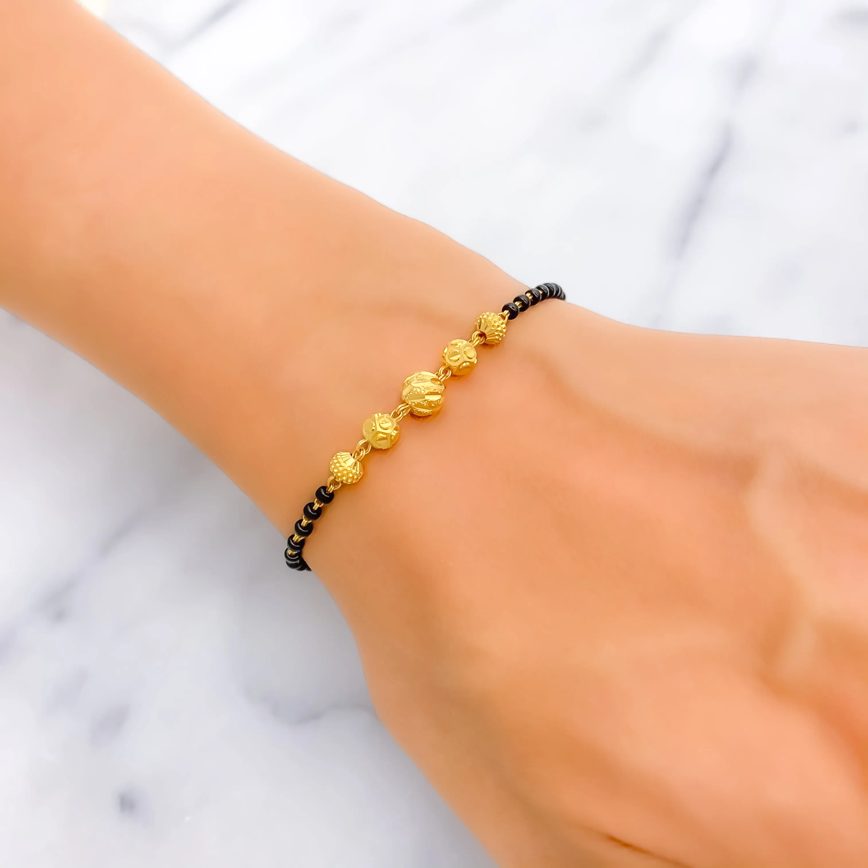 Elevated Fashionable 22k Gold Black Bead Bracelet