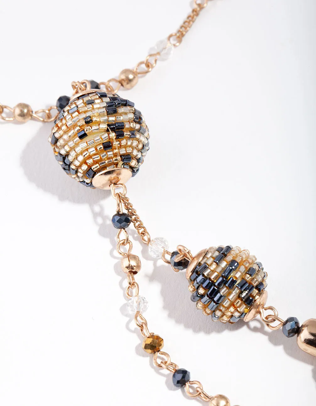 Gold Bugle Bead Tassel Necklace