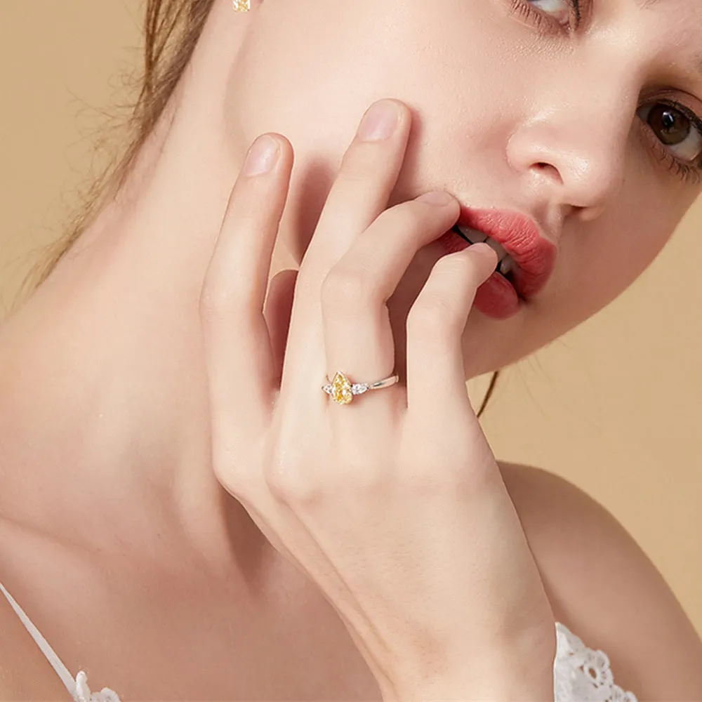 Pear Cut GIA Fancy Yellow Diamond Three Stone Ring