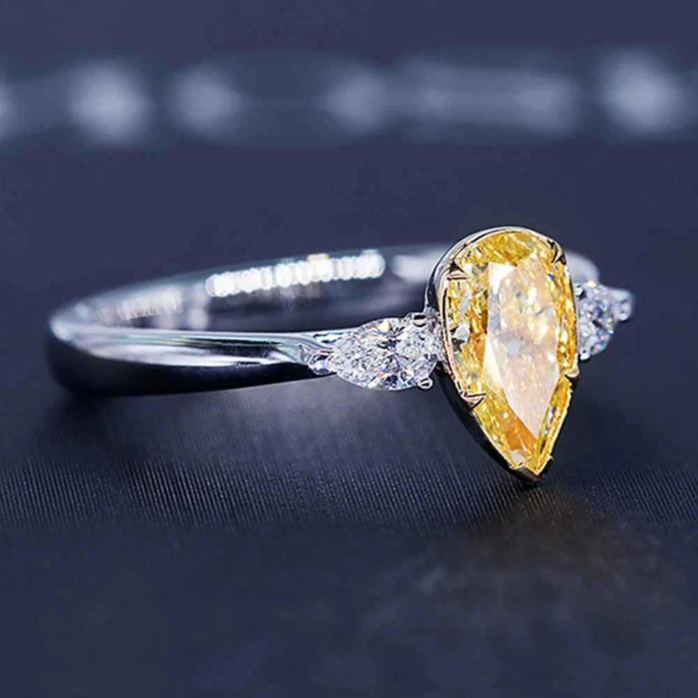 Pear Cut GIA Fancy Yellow Diamond Three Stone Ring