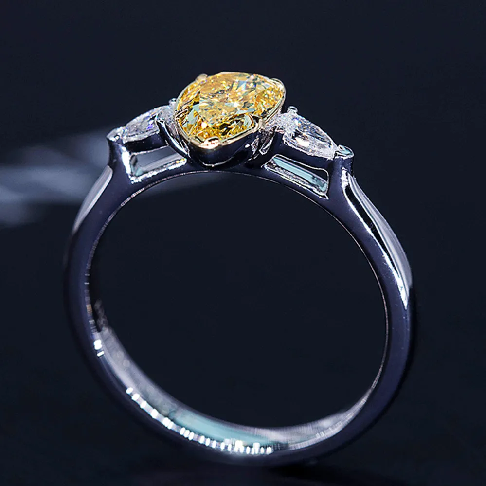 Pear Cut GIA Fancy Yellow Diamond Three Stone Ring