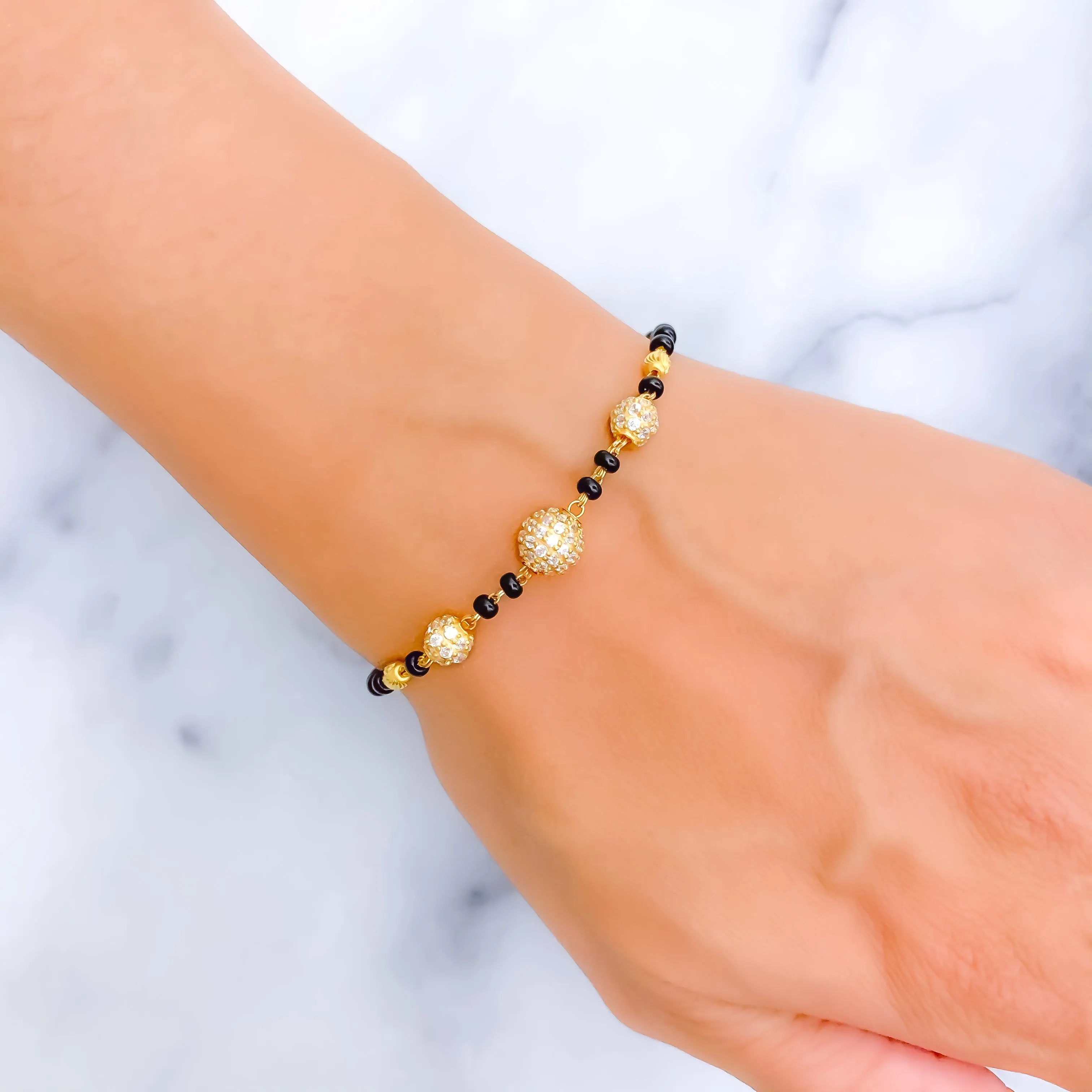 Shiny Refined 22k Gold Black Bead CZ Bracelet