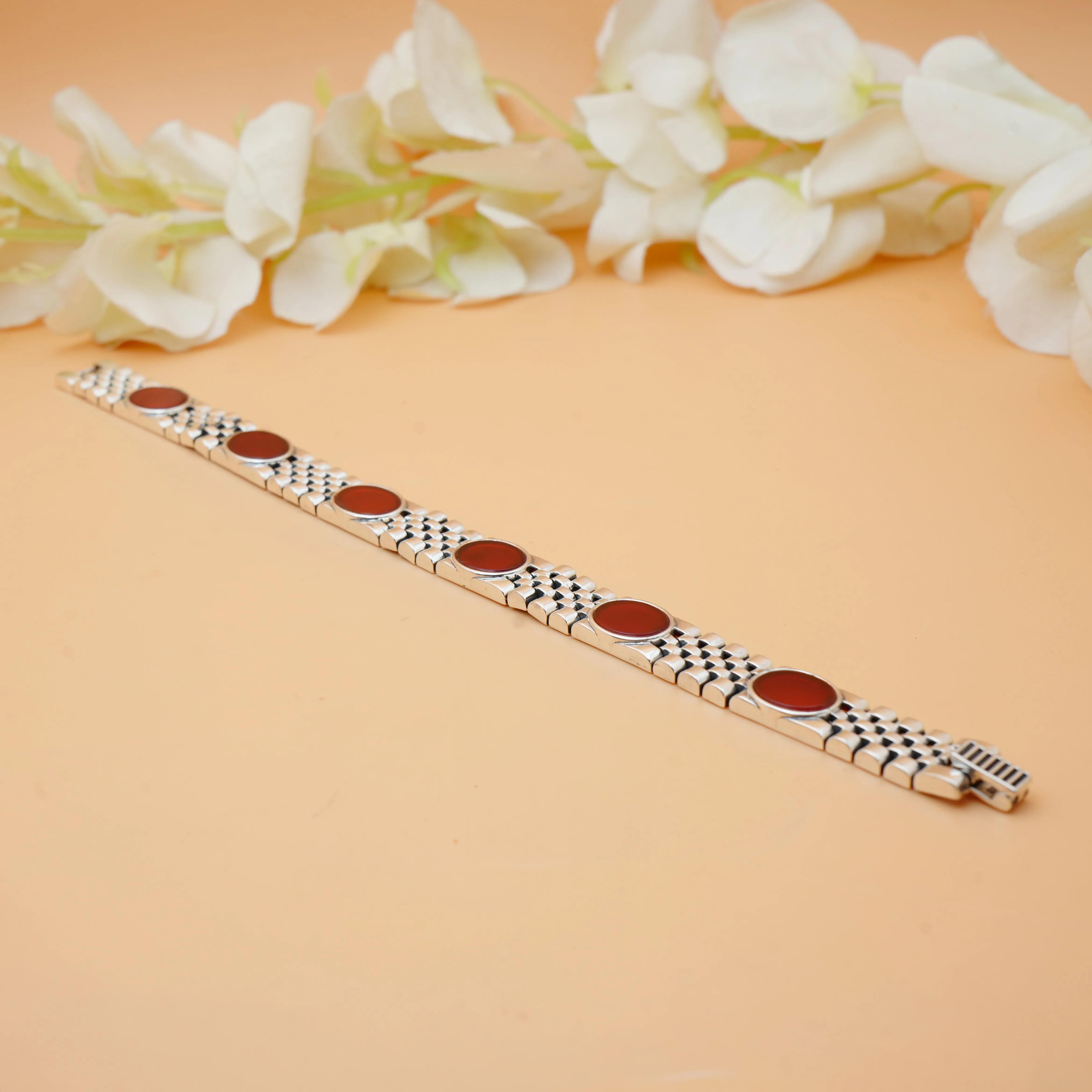 Sleek Silver Bracelet for Boys with Eye-catching Red Stones