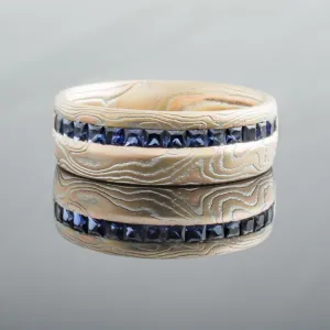 Unique Mokume Gane Ring or Wedding Band Channel Set in Woodgrain Pattern and Fire Palette with Sapphires